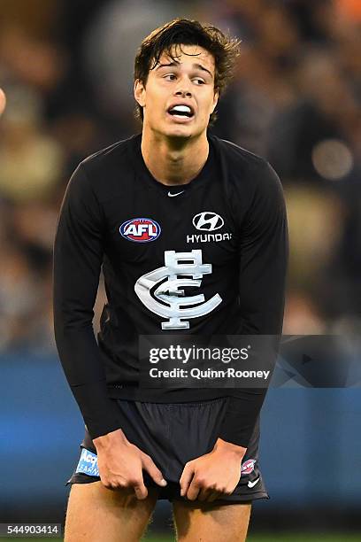 Jack Silvagni of the Blues catches his breath during the round 15 AFL match between the Carlton Blues and the Collingwood Magpies at Melbourne...