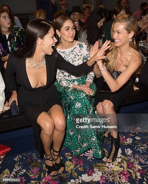 Adriana Lima, Champoo Araya A Hargate and Petra Nemcova attend the Ralph & Russo Haute Couture Fall/Winter 2016-2017 show as part of Paris Fashion...