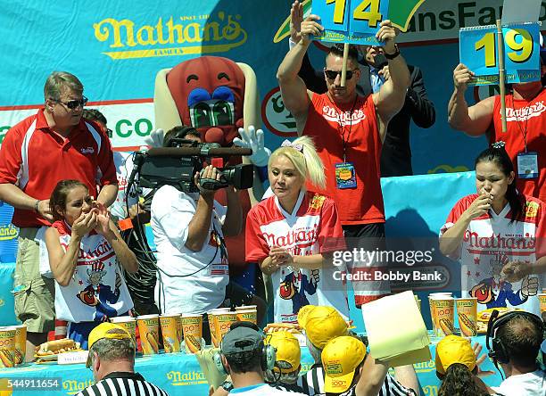 Competitive eaters Michelle Lesco, Miki Sudo and Sonya Thomas compete in the women's division of the 2016 Nathans Famous 4th Of July International...