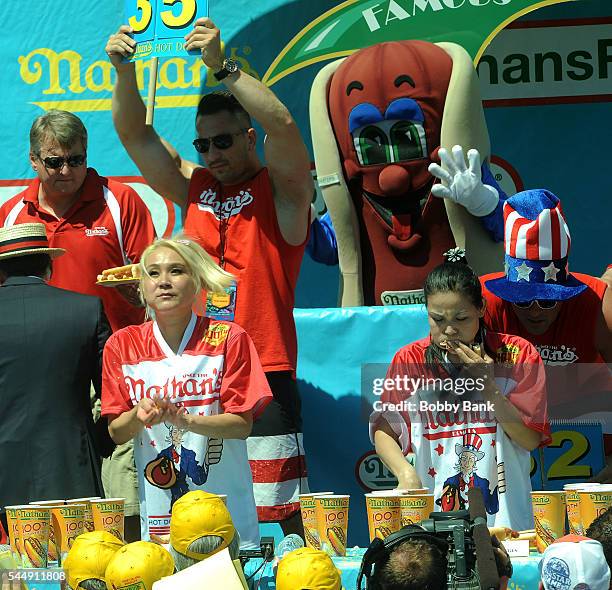 Competitive eaters Miki Sudo and Sonya Thomas compete in the women's division of the 2016 Nathans Famous 4th Of July International Hot Dog Eating...