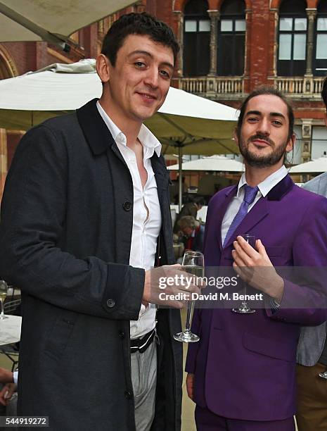 John Dagleish and George Maguire attend the Olivier Awards Summer Party in celebration of the new exhibition "Curtain Up" at The V&A on July 4, 2016...