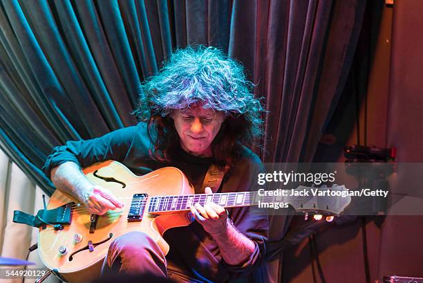 American Jazz musician Pat Metheny plays guitar as he performs onstage with Roy Haynes and his Fountain of Youth Band on Haynes' 90th birthday at the...