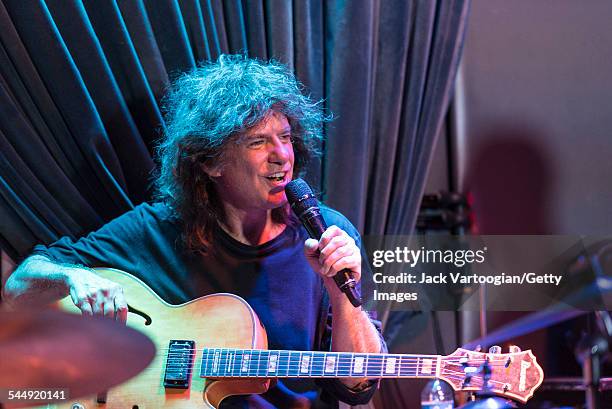 American Jazz musician Pat Metheny plays guitar as he performs onstage with Roy Haynes and his Fountain of Youth Band on Haynes' 90th birthday at the...