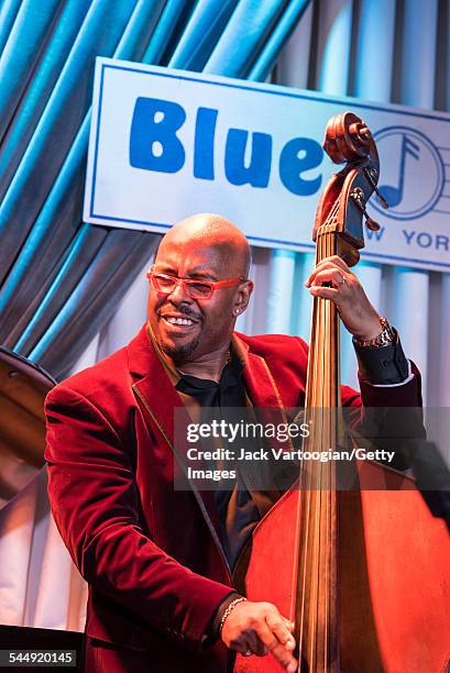 American Jazz musician Christian McBride plays upright acoustic bass as he performs onstage with Roy Haynes and his Fountain of Youth Band on Haynes'...