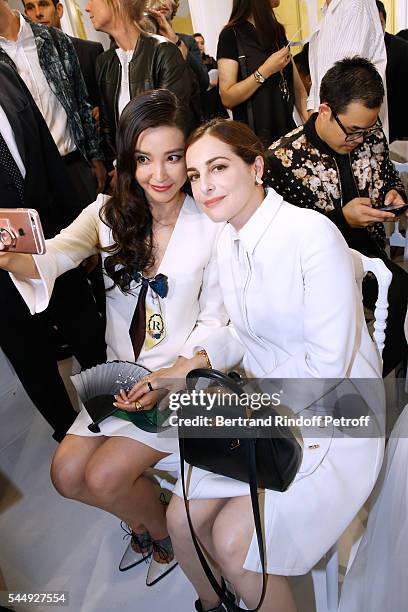 Li Bing Bing and Amira Casar attend the Christian Dior Haute Couture Fall/Winter 2016-2017 show as part of Paris Fashion Week on July 4, 2016 in...