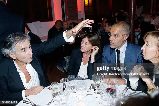 Bernard-Henri Levy, Nathalie Bloch-Laine, Kamel Mennour and Patricia Marshall attend "Peshmerga" Private Screening at Galerie Azzedine Alaia on July...