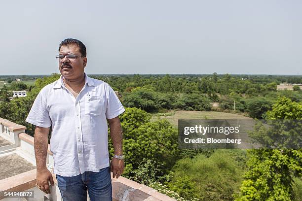 Landowner Kunwar Vikram Jeet Singh stands on the roof of his mansion in Kuchesar, Uttar Pradesh, India, on Tuesday, May 24, 2016. Singh is one of...