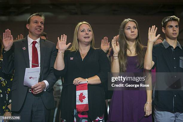 Sixty new citizens from 26 countries swear their allegiance to their new nation during a special Canada Day ceremony on July 1, 2016 in Vancouver,...