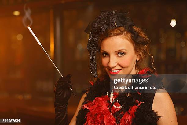 old-fashioned  young woman   smoking cigarette retro bar - speakeasy stock pictures, royalty-free photos & images