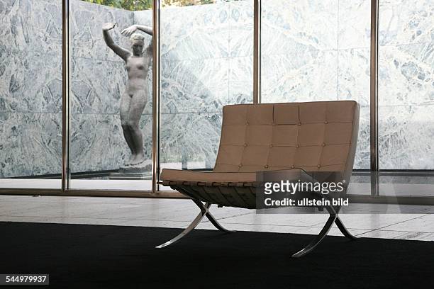 Spain, Barcelona: Barcelona Pavilion for the International exhibition 1929 built by Ludwig Mies van der Rohe, barcelona-chair, in the background...