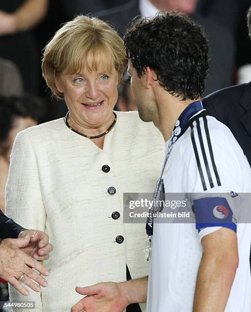 Merkel, Angela - Politician, CDU, Germany, Federal Chancellor - and German Michael Ballack after the lost final Germany - Spain at the Ernst Happel...