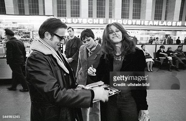 Uschi Obermaier - Model, Author, Germany - giving an autograph at Tempelhof airport in Berlin,