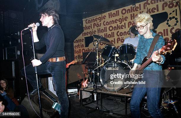 Band, Rock music, Ireland - Saenger Bono Vox und Bassist Adam Clayton performing in Hamburg, Germany - 1981