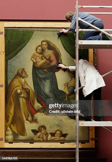 Germany - Saxony - Dresden: Paitings being cleansed at the picture-gallery "Alte Meister, Old Masters Picture Gallery" part of the Dresden State Art...