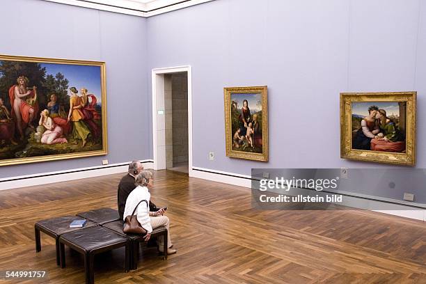 Germany - Bavaria - Muenchen Munich: visitors watching at paintings at the modern art museum Pinakothek der Moderne
