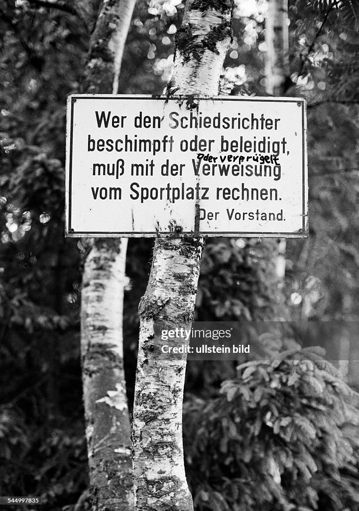 Football Germany, amateur class, sign informing visitors about the behaviour to protect the referee team,