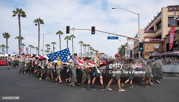 Huntington Beach Boy Scouts carry the citys historic Freedom Flag at the 112th Annual Huntington Beach 4th of July Parade on July 4, 2016 in...