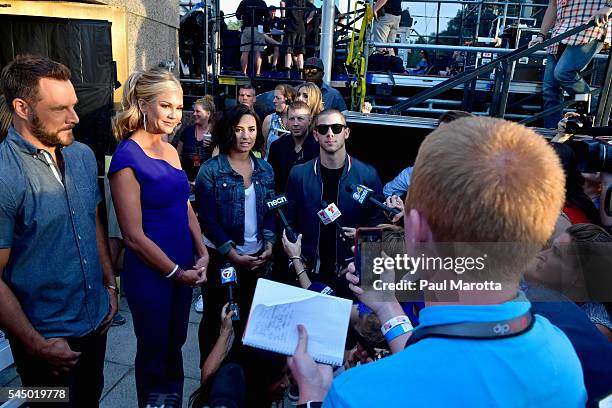 Jimi Westbrook, Nancy O'Dell, Demi Lovato, Nick Jonas and Keith Lockhart speak to the press prior to the Boston Pops Fireworks Spectacular at the DCR...