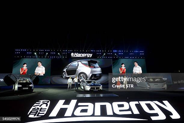 This photo taken on July 2, 2016 shows Hanergy's solar-powered cars on display during a launch event in Beijing. Thin-film power giant Hanergy...