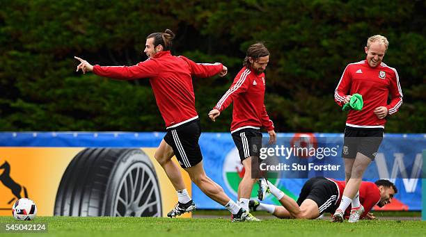 Wales player Gareth Bale laughs with Joe Allen, Jonny Williams and Hal Robson-Kanu during Wales training ahead of their UEFA Euro 2016 Semi final...