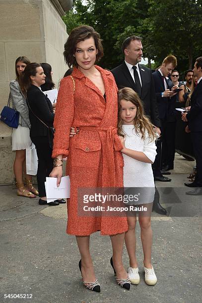 Milla Jovovich and her daughter Ever Gabo Anderson are seen arriving at Chanel Fashion show during Paris Fashion Week : Haute Couture F/W 2016-2017...