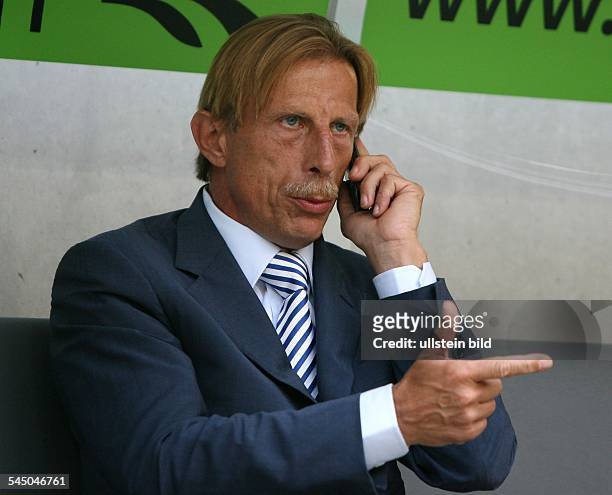 Daum, Christoph - Football, Coach, 1. FC Koeln, Germany - using his mobile phone