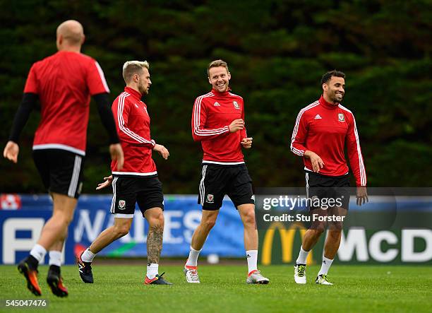 Wales player Chris Gunter shares a joke with team mates during Wales training ahead of their UEFA Euro 2016 Semi final against Portugal at College Le...