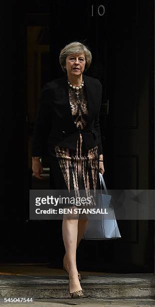 British Home Secretary Theresa May leaves after attending a cabinet meeting at 10 Downing Street in central London on July 5, 2016. In a move that...