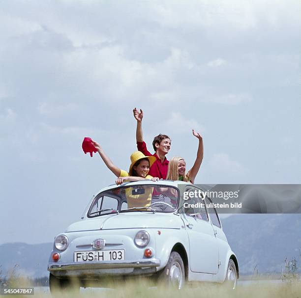 Germany - : young people with a Fiat 500 -