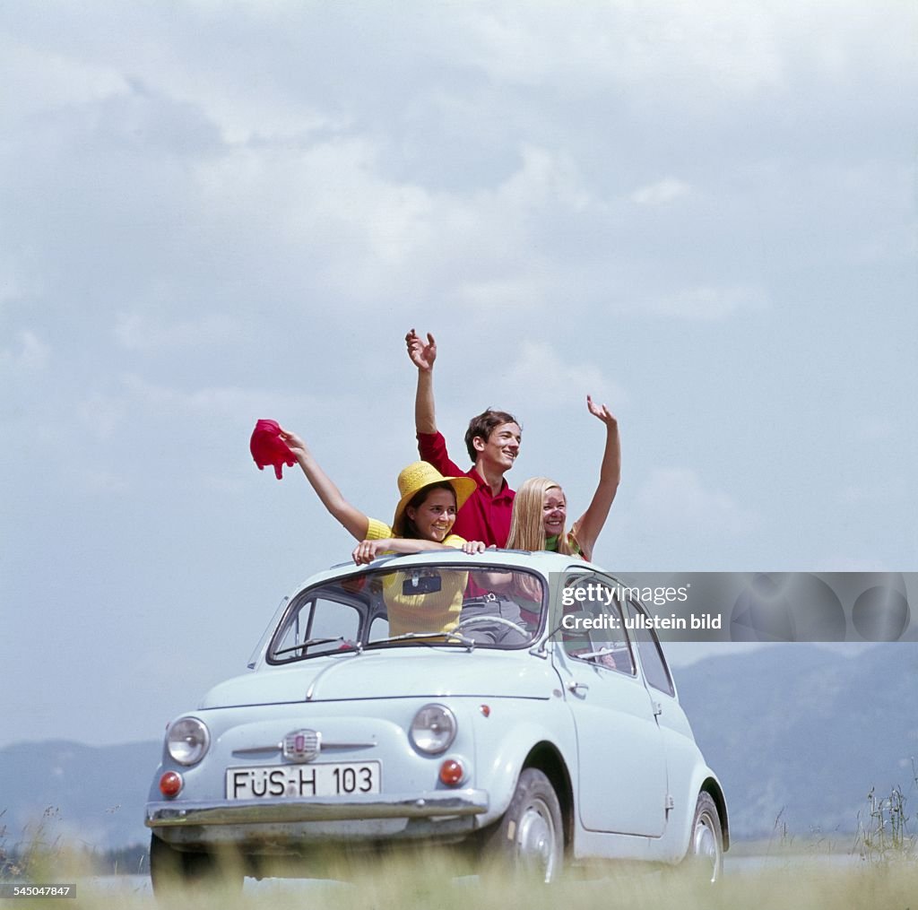 Germany - : young people with a Fiat 500 -