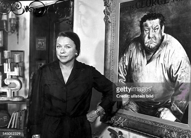 1987Schauspielerin, BRDvor dem Gemälde ihres Mannes HeinrichGeorge- 1968