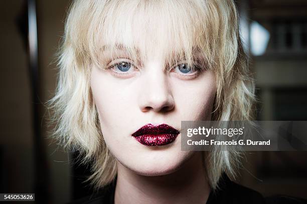 Models pose backstage prior the Atelier Versace Haute Couture Fall/Winter 2016-2017 show as part of Paris Fashion Week on July 3, 2016 in Paris,...