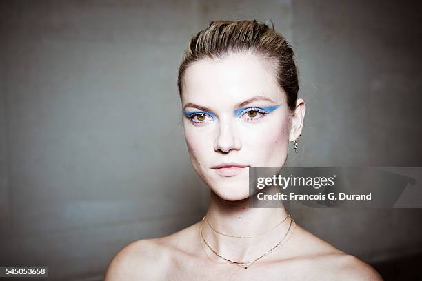 Model poses Backstage prior the Atelier Versace Haute Couture Fall/Winter 2016-2017 show as part of Paris Fashion Week on July 3, 2016 in Paris,...