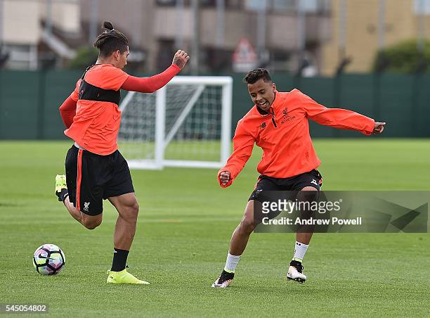 Allan Rodrigues De Souza and Roberto Firmino of Liverpool duringa training session at Melwood Training Ground on July 5, 2016 in Liverpool, England.