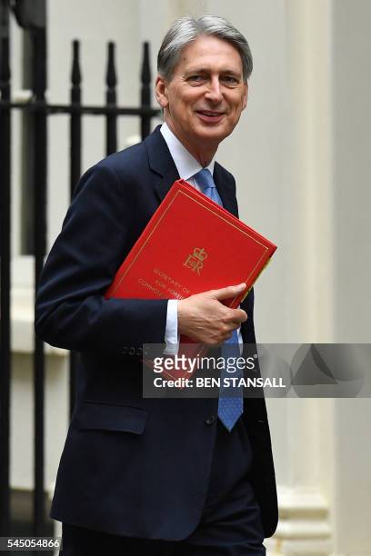 British Foreign Secretary Philip Hammond arrives to attend a cabinet meeting in central London on July 5, 2016. - In a move that sent world financial...