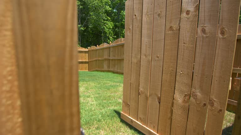https://media.gettyimages.com/id/545062310/video/new-fence-gate-opens-to-reveal-backyard.jpg?b=1&s=640x640&k=20&c=HNVy6p4wQX34TaVkzonh659pg75CxgBIyKhu8dwe5Fo=