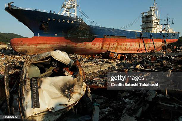 Fishing boat which was destroyed and pushed up on the land by the earthquake and tsunami that hit northeastern Japan on March 11, 2011.