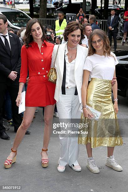 Ines de la Fressange with daughters Nine d'Urso and Violette d'Urso arrive at the Chanel Haute Couture Fall/Winter 2016-2017 show as part of Paris...