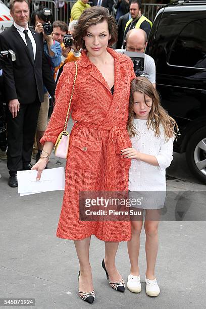 Milla Jovovich and her daughter Ever Gabo Anderson arrive at the Chanel Haute Couture Fall/Winter 2016-2017 show as part of Paris Fashion Week on...