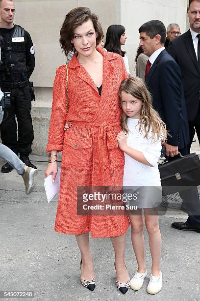 Milla Jovovich and her daughter Ever Gabo Anderson arrive at the Chanel Haute Couture Fall/Winter 2016-2017 show as part of Paris Fashion Week on...