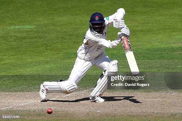 Haseeb Hameed of Lancashire drives for four runs during the Specsavers County Championship division one match between Nottinghamshire and Lancashire...