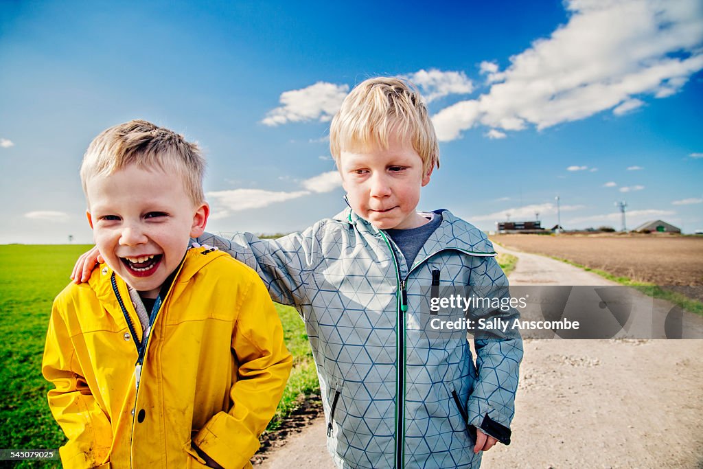 Two brothers laughing together