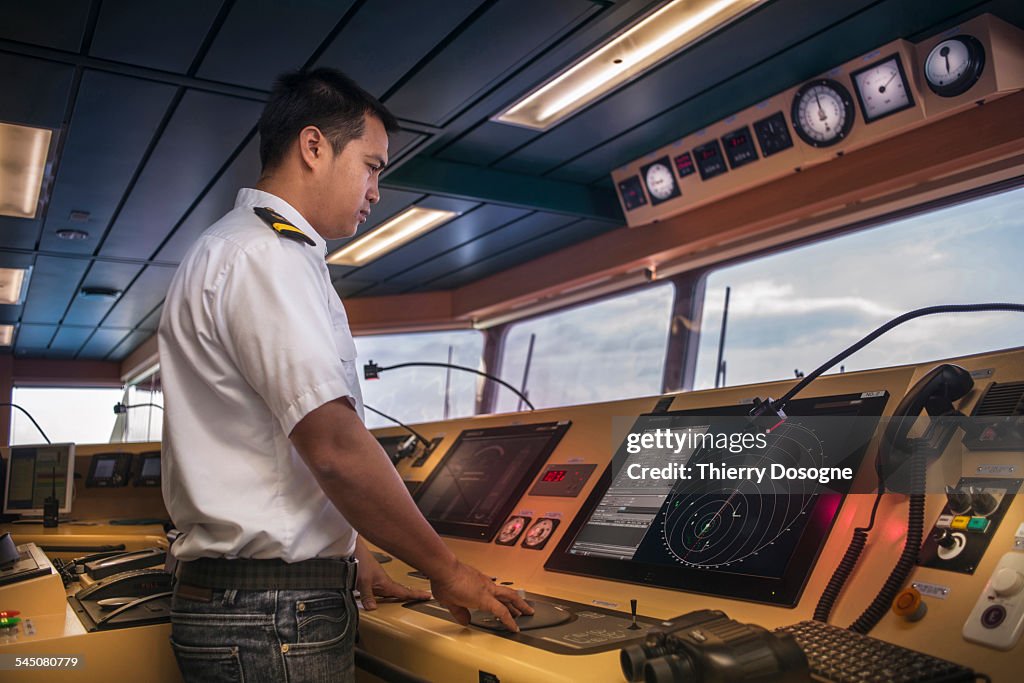 Officer ship looking radar screen