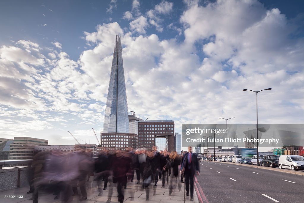 Commuters on London Bridge in London, England