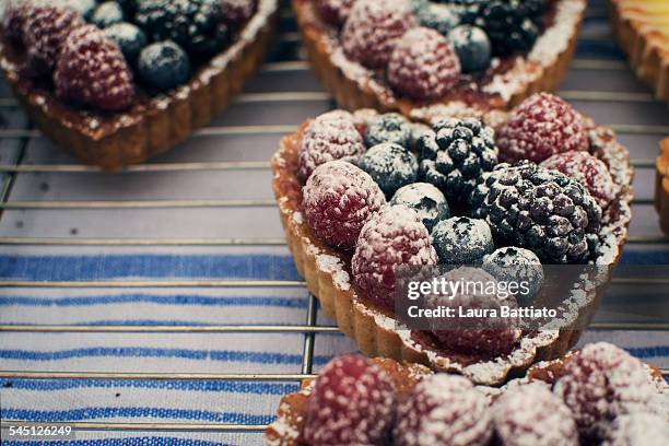red fruits tartlet - blackberry jam stock pictures, royalty-free photos & images