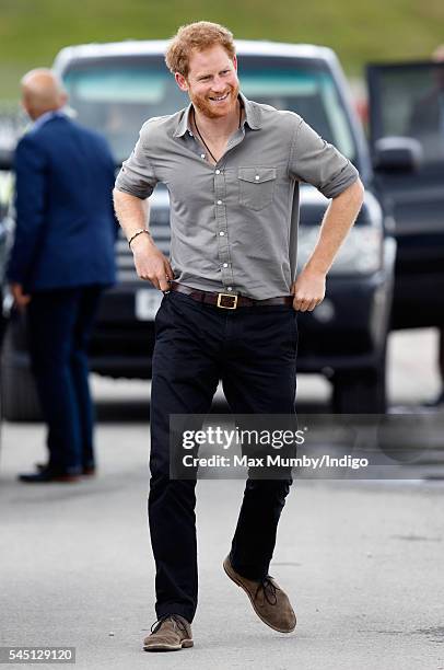 Prince Harry visits the Blair Project at the Three Sisters Raceway during a day of engagements on July 5, 2016 in Wigan, England.