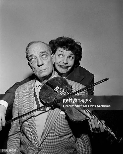 Actress Martha Raye poses with Buster Keaton for the "Martha Raye Show" show hosted by Martha Raye in New York, New York.