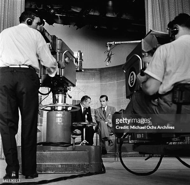 Ed Sullivan sits and interviews Edward R. Murrow on the "Toast of the Town" show hosted by Ed Sullivan at the Maxine Elliott Theater in New York, New...