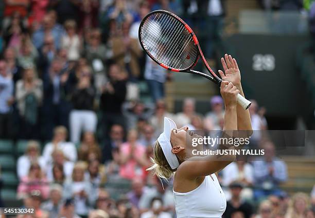 Russia's Elena Vesnina celebrates beating Slovakia's Dominika Cibulkova after their women's singles quarter-final match on the ninth day of the 2016...