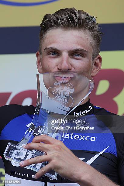 Marcel Kittel of Germany, riding for Etixx-Quick Step celebrates on the podium after winning stage four of the 2016 Le Tour de France a 237.5km stage...